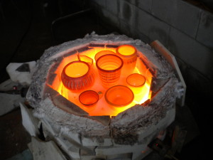 Glowing pots after kiln unit is removed.