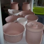 Brown Stoneware and Porcelain, bisqued and ready for glaze.